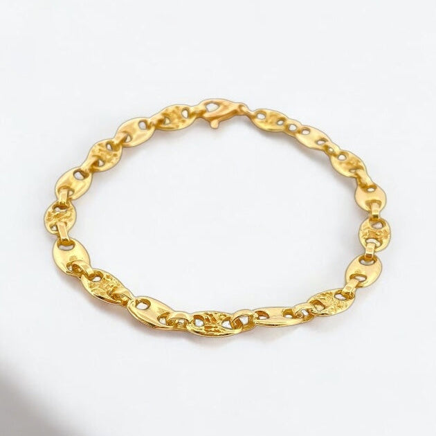 Pulsera de oro de 18kt con cadena tipo calabrote intercalada con pieza con textura y pieza lisa de 6,10mm de grosor y medida. Joyería de segunda mano restaurada Barcelona.