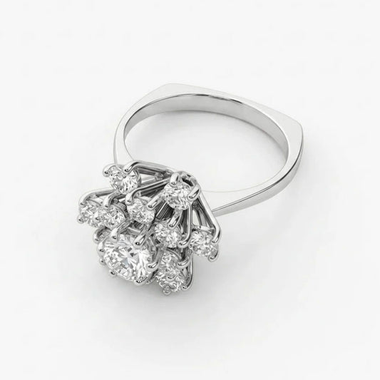 Comprar Sortija realizada en oro blanco de 18kt con rosetón de diamantes alrededor de un diamante central más grande engastado en grapas. Joyas con diamantes.