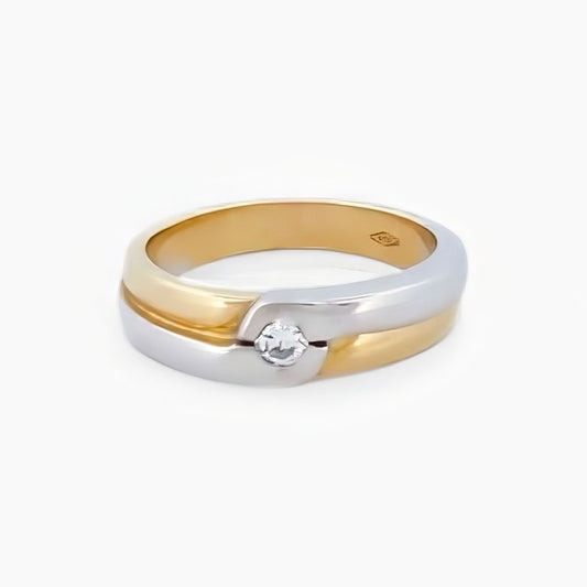 Comprar sortija bicolor lisa de oro blanco y amarillo de 18kt con diamante central. Joyas segunda mano restauradas baratas en Barcelona. Envío gratis.