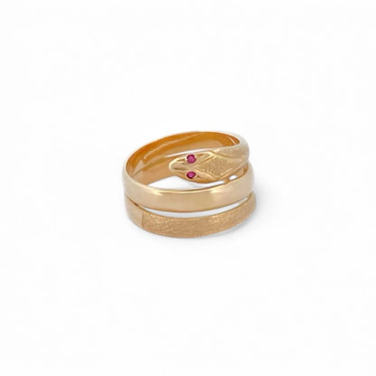 Anillo realizado en oro amarillo de 18kt en forma de serpiente. La banda de central es lisa y las otras dos son con textura. Joyas restauradas en Barcelona. 