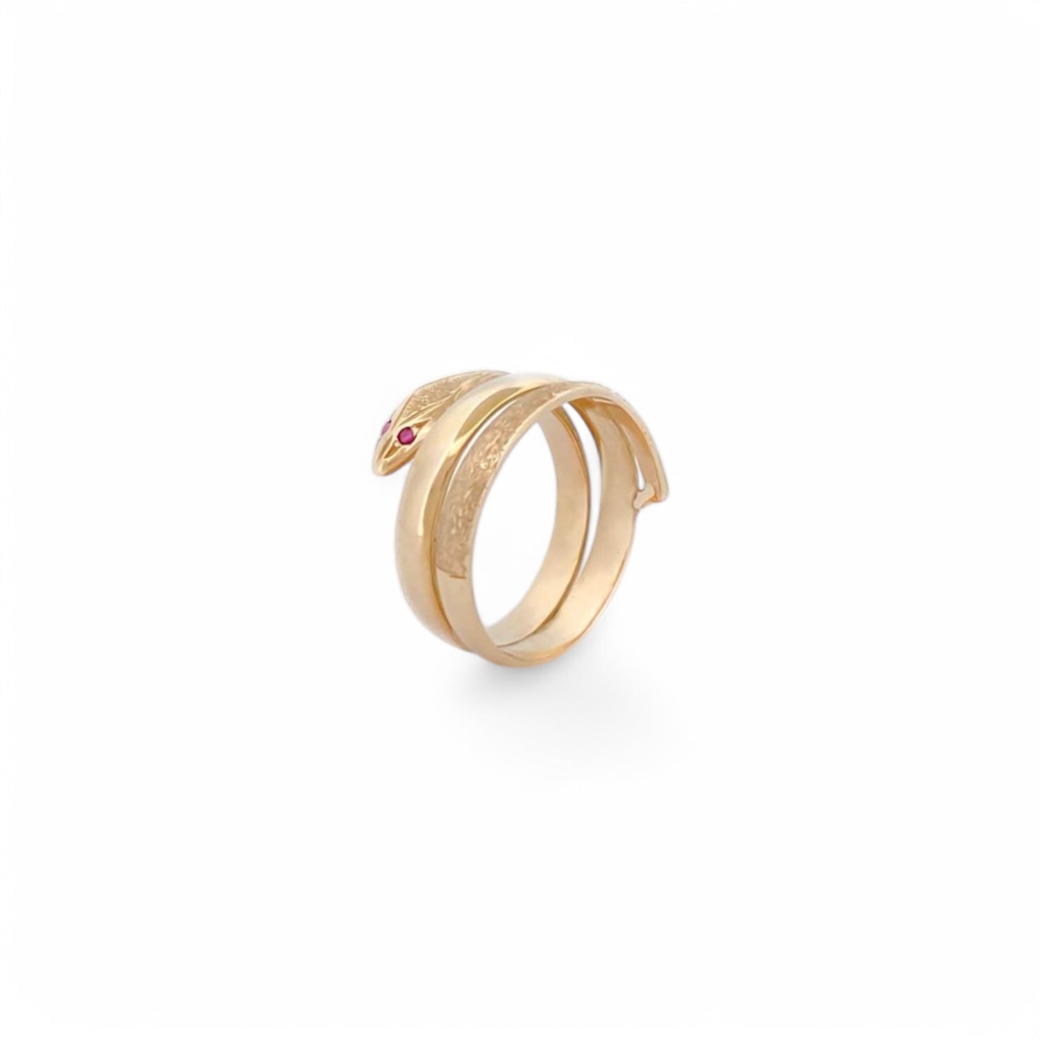 Anillo realizado en oro amarillo de 18kt en forma de serpiente. La banda de central es lisa y las otras dos son con textura. Joyas restauradas en Barcelona. 