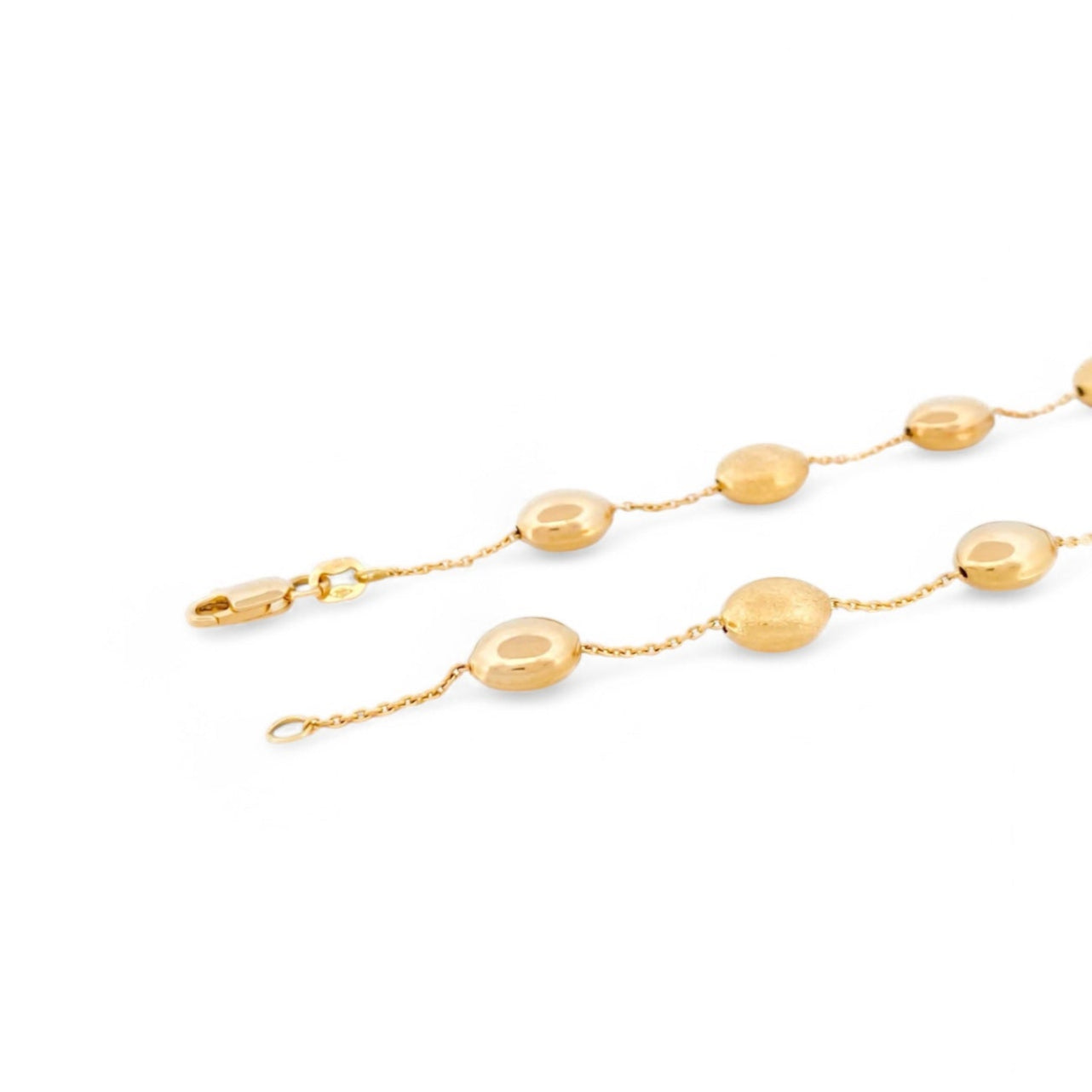 Comprar collar de oro amarillo de 18kt con cadena y bolitas intercaladas lisas y con textura. La cadena mide 44cm de largo. Joyas Barcelona. Joyería Ian'Or. 