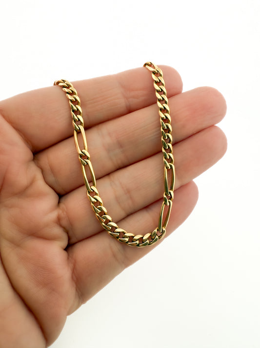 Collar con cadena alterna barbada en oro amarillo de 18kt y cierre de cajón con un brazo de seguridad. Joya unisex. Joyería Ian'Or. Envío GRATIS.

