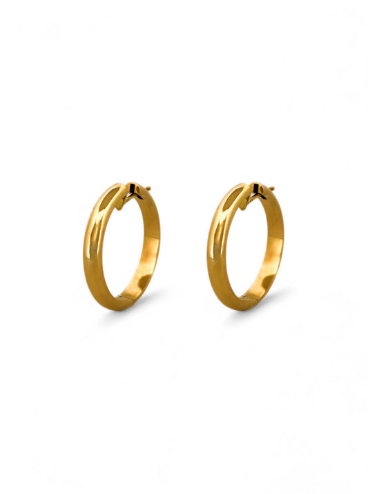 Pendientes de aro de oro amarillo de 18kt de 35mm de diámetro y 5,3mm de grosor. Disponen de cierre tipo criolla. Criollas de oro 18kt al mejor precio.
