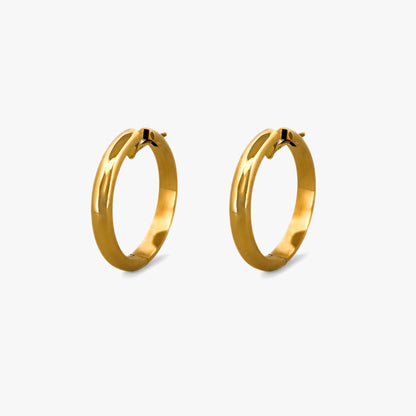 Pendientes de aro de oro amarillo de 18kt de 35mm de diámetro y 5,3mm de grosor. Disponen de cierre tipo criolla. Criollas de oro 18kt al mejor precio.