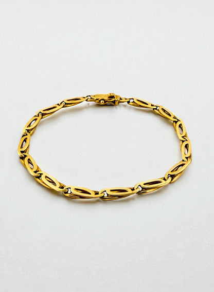 Pulsera oro amarillo de 18kt con cadena eslabones tipo ojo de tigre. La pulsera mide 19,5cm Pulseras de oro 18kt al mejor precio en Barcelona.