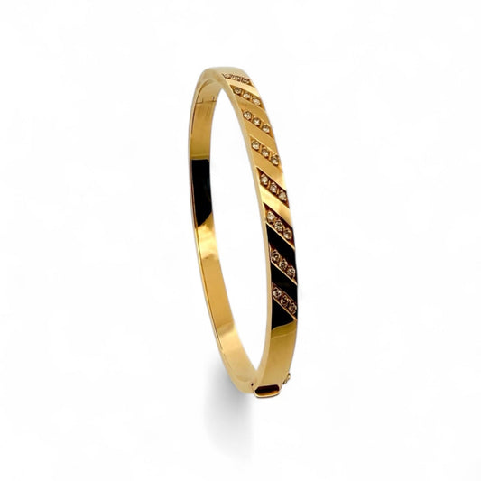 Comprar pulsera esclava de oro amarillo de 18kt con diamantes en la parte de delante de la pulsera. Joyas de segunda mano. Esclavas de oro de 18kt en Ian'Or.