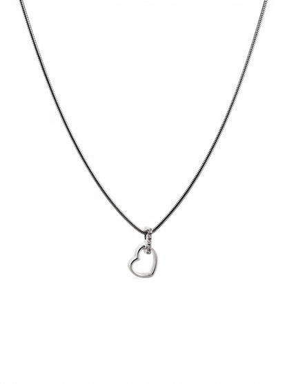 Comprar colgante corazón de oro blanco de 19kt y con balía de brilantes. Joyas corazón de oro al mejor precio.