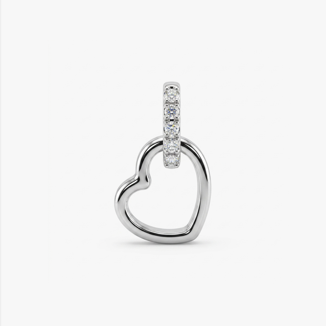 Comprar colgante corazón de oro blanco de 19kt y con balía de brilantes. Joyas corazón de oro al mejor precio.