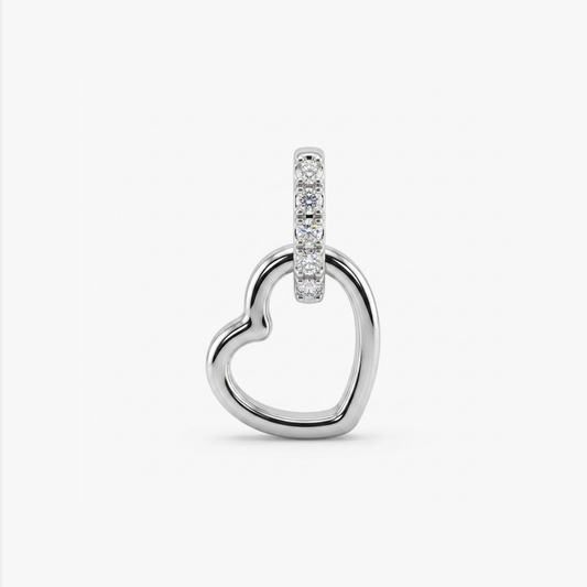 Comprar colgante corazón de oro blanco de 19kt y con balía de brilantes. Joyas corazón de oro al mejor precio.