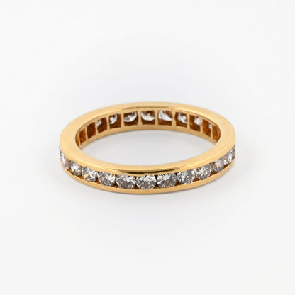 Comprar alianza completa en oro amarillo de 18kt con carril de diamantes talla brillante. Joyas de segunda mano. Joyas con diamantes. Joyería Ian'Or.