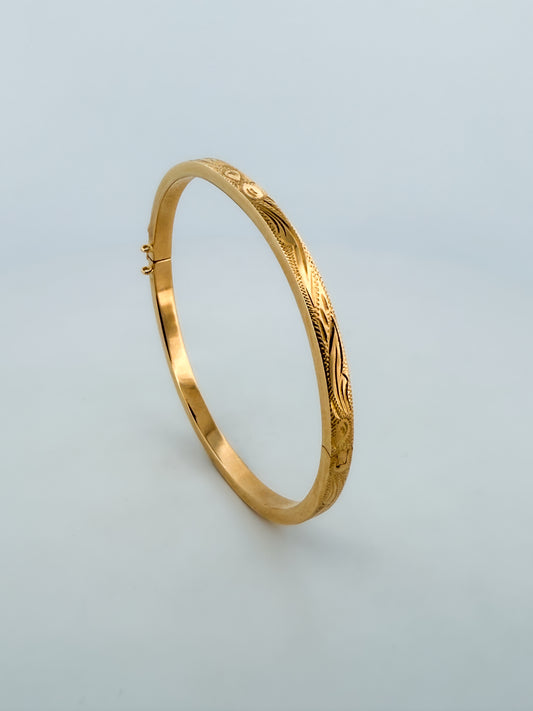 Comprar pulsera esclava de Oro amarillo de 18k con detalles grabados. Esclavas de oro al mejor precio. Joyería Ian'Or.