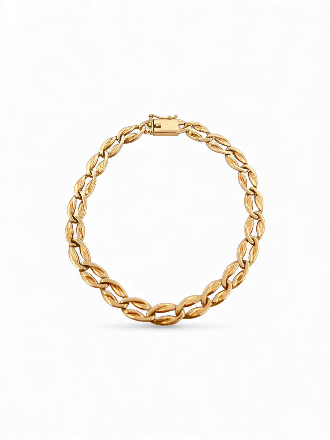 Comprar pulsera realizada en oro amarillo de 18kt con eslabones ovalados y planos y cierre con brazo de seguridad. Cadenas de oro 18kt baratas al mejor precio.
