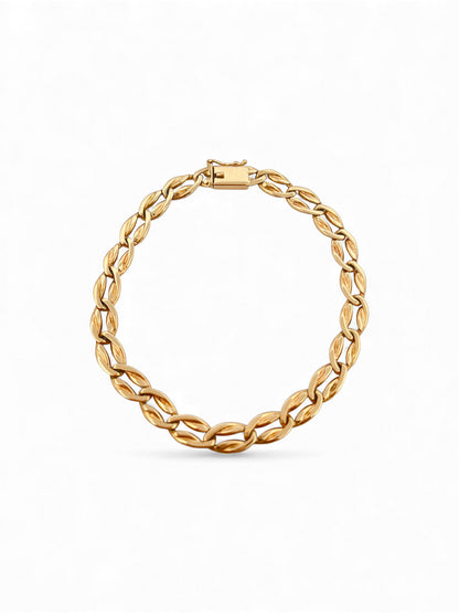Comprar pulsera realizada en oro amarillo de 18kt con eslabones ovalados y planos y cierre con brazo de seguridad. Cadenas de oro 18kt baratas al mejor precio.