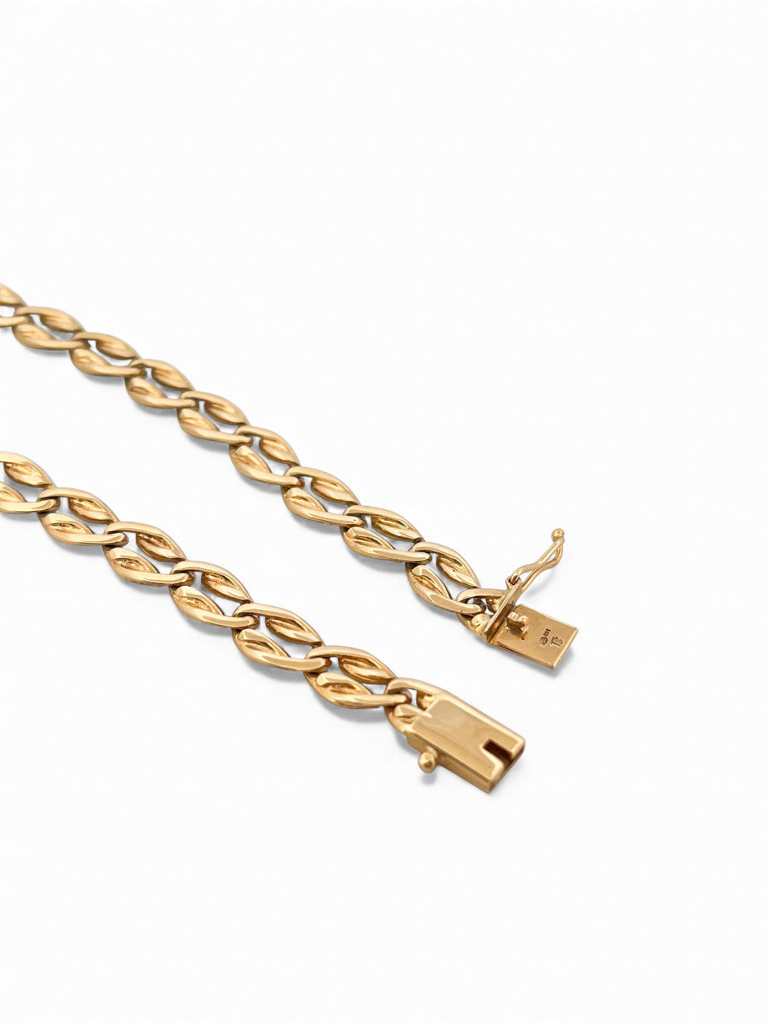 Comprar pulsera realizada en oro amarillo de 18kt con eslabones ovalados y planos y cierre con brazo de seguridad. Cadenas de oro 18kt baratas al mejor precio.