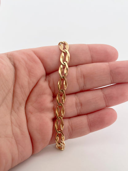 Comprar pulsera realizada en oro amarillo de 18kt con eslabones ovalados y planos y cierre con brazo de seguridad. Cadenas de oro 18kt baratas al mejor precio.