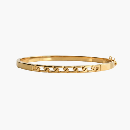 Comprar pulsera esclava de oro amarillo de 18kt con detalles en un lateral de la pulsera. Esta preciosa pulsera rígida dispone de cierre de cajón con brazo de seguridad. Esclavas de oro al mejor precio. Joyería Ian'Or.
