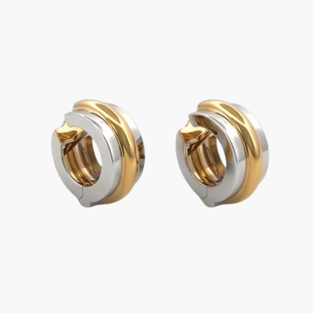 Comprar pendientes bicolor en oro blanco y amarillo de 18kt en forma de aros. Disponen de cierre tipo omega.Pendientes de oro baratos Ian'Or. Pendientes oro 18kt. Envío gratis.