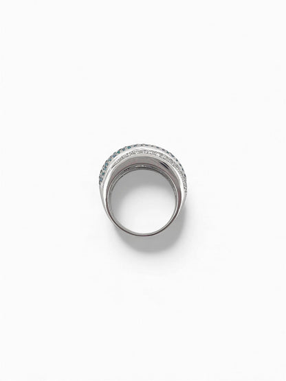 Comprar anillo de tres carriles realizado en oro blanco de 18kt , diamantes talla brillante y topacios. Dos carriles llevan diamantes platas y el del medio topacios