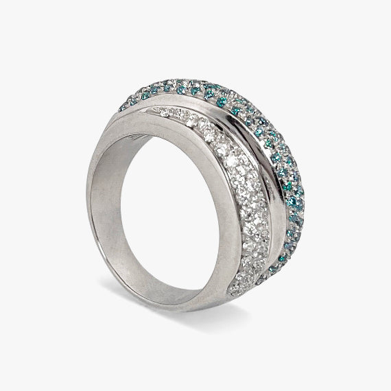 Comprar anillo de tres carriles realizado en oro blanco de 18kt , diamantes talla brillante y topacios. Dos carriles llevan diamantes platas y el del medio topacios