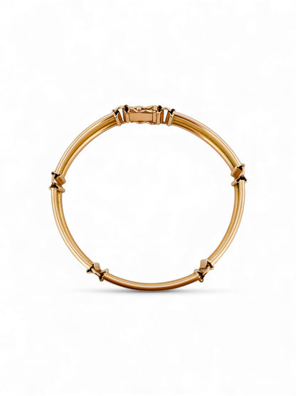 Comprar pulsera semirígida realizada en Oro amarillo de 18kt con cierre de seguridad. La pulsera mide 17,5cm.