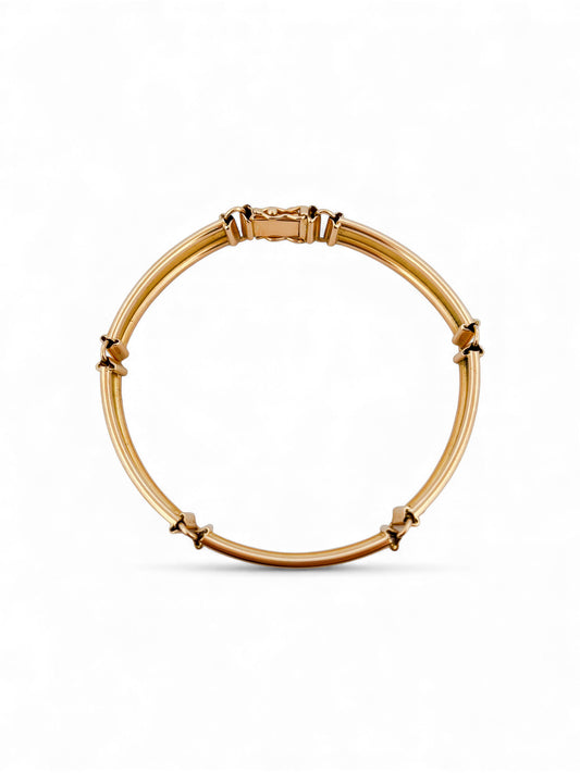 Comprar pulsera semirígida realizada en Oro amarillo de 18kt con cierre de seguridad. La pulsera mide 17,5cm.