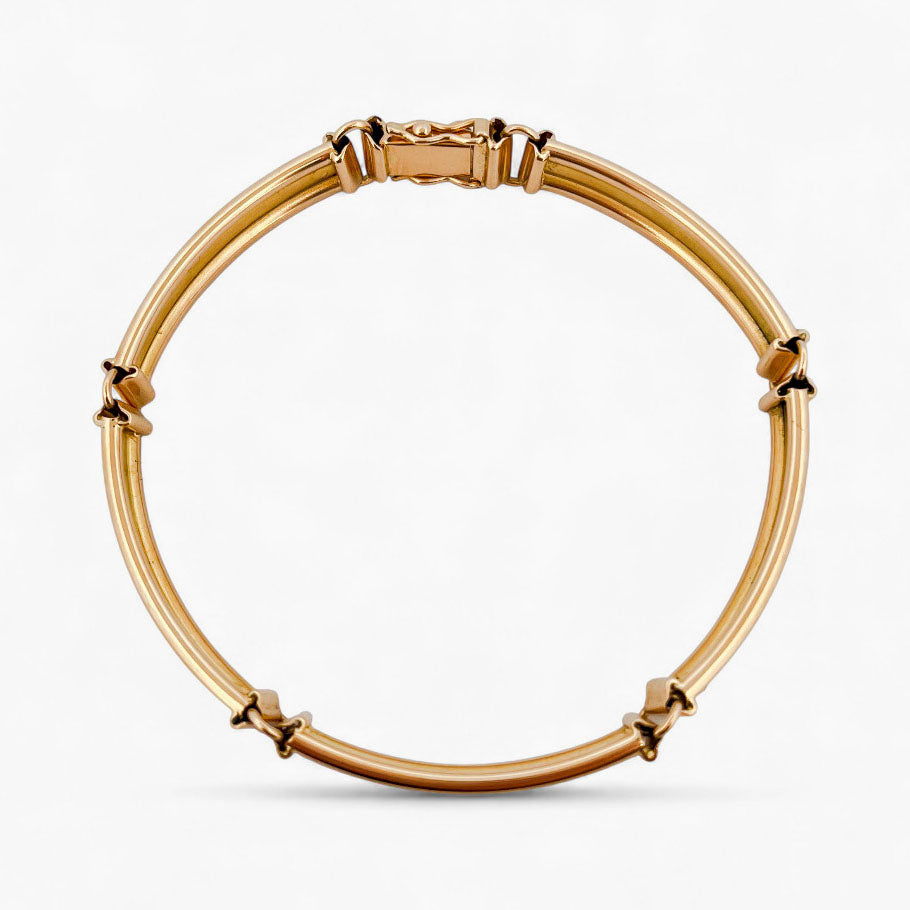 Comprar pulsera semirígida realizada en Oro amarillo de 18kt con cierre de seguridad. La pulsera mide 17,5cm. Envío gratis