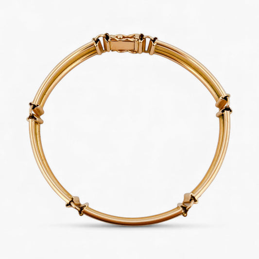 Comprar pulsera semirígida realizada en Oro amarillo de 18kt con cierre de seguridad. La pulsera mide 17,5cm. Envío gratis