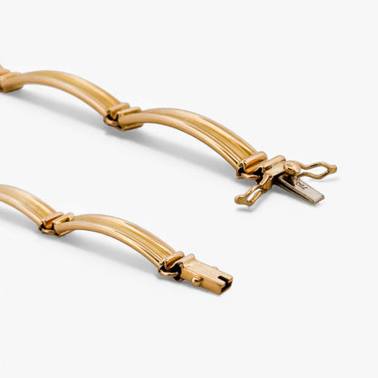 Comprar pulsera semirígida realizada en Oro amarillo de 18kt con cierre de seguridad. La pulsera mide 17,5cm. Envío gratis