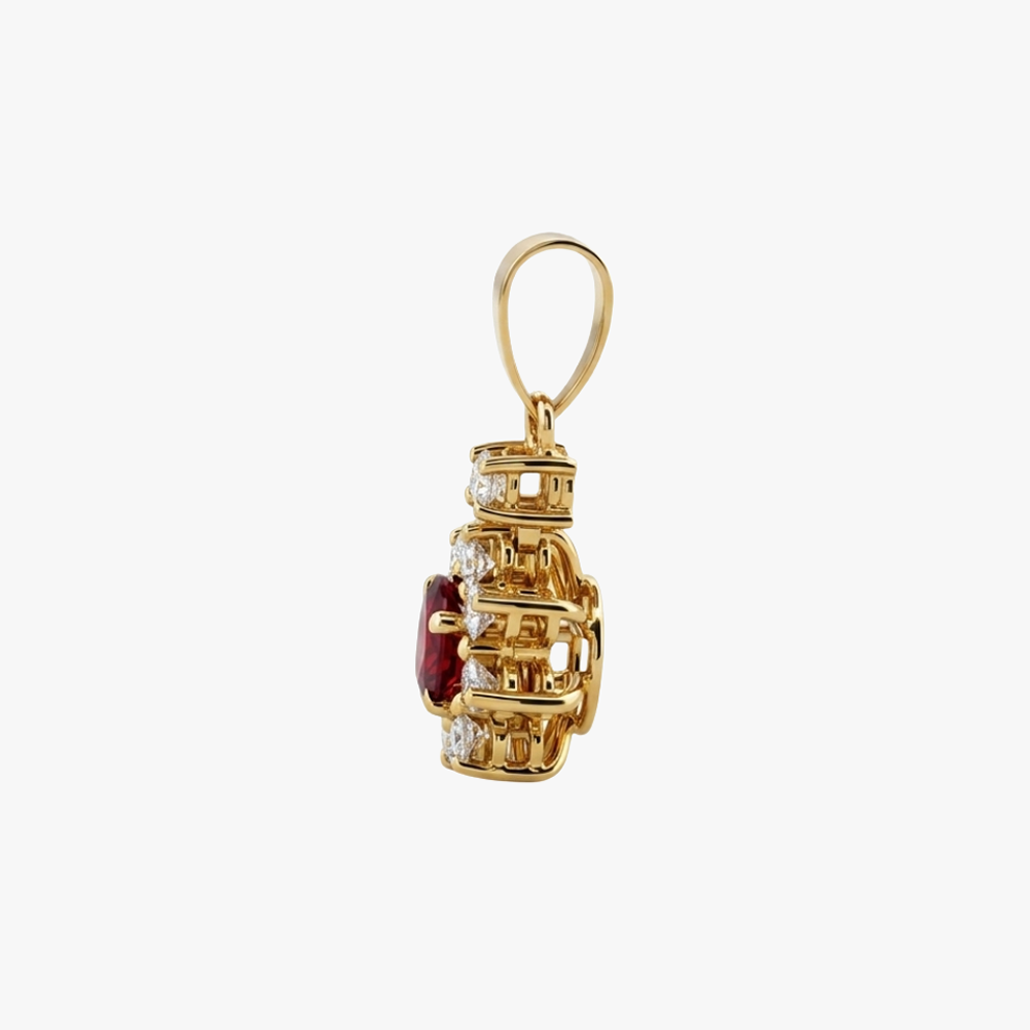 Comprar colgante antiguo realizado en oro amarillo de 18kt con rosetón de rubí talla oval y orla de brillantes, joyas vintage con rubíes de oro 18kt