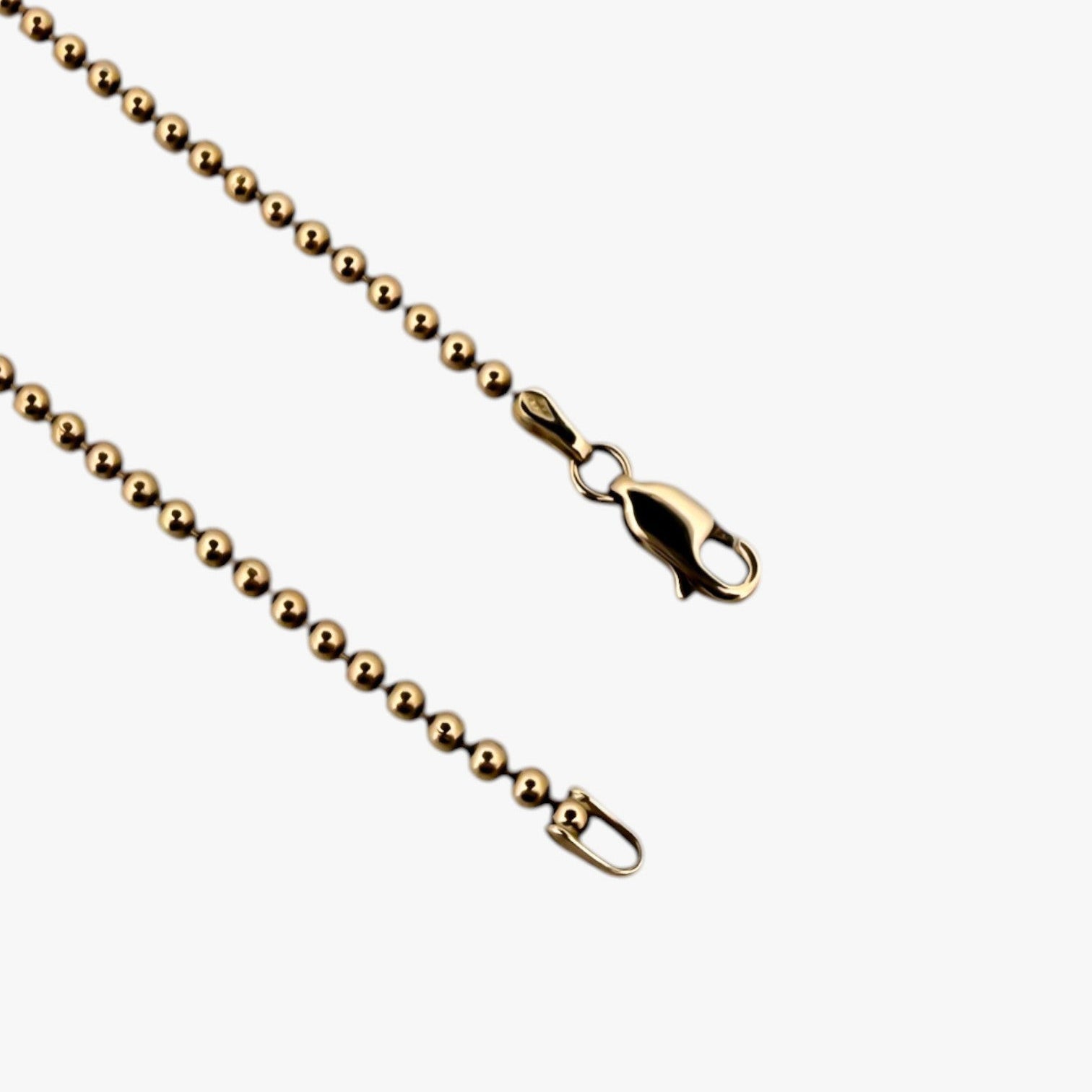 Comprar collar con cadena de bolas en oro amarillo de 18kt y cierre tipo mosquetón. Joya unisex. Envío GRATIS. Joyería Ian'Or.