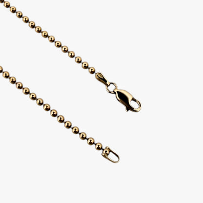 Comprar collar con cadena de bolas en oro amarillo de 18kt y cierre tipo mosquetón. Joya unisex. Envío GRATIS. Joyería Ian'Or.