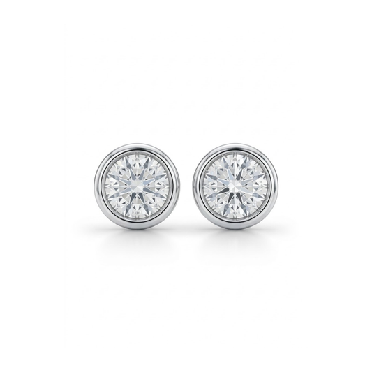 Comprar pendientes tipo dormilonas realizados en oro blanco de 18kt y brillantes con engaste en chatón.  dormilonas de oro blanco y diamantes al mejor precio.