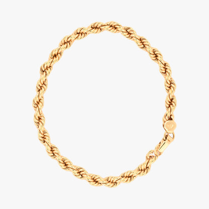 Comprar Pulsera de cordón de oro amarillo de 18kt de 19,5 cm de largo caracterizada por su diseño trenzado en espiral y un cierre de mosquetón. Pulseras de oro 18kt al mejor precio en Barcelona.