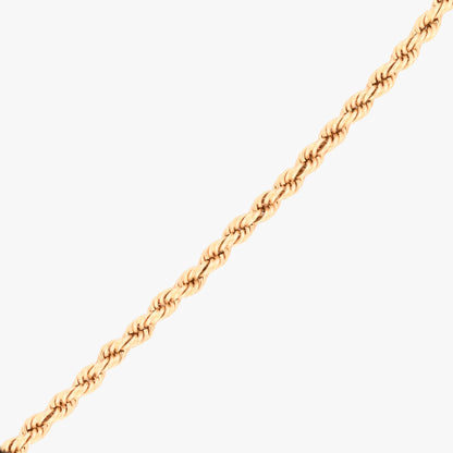 Comprar Pulsera de cordón de oro amarillo de 18kt de 19,5 cm de largo caracterizada por su diseño trenzado en espiral y un cierre de mosquetón. Pulseras de oro 18kt al mejor precio en Barcelona.