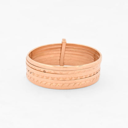Anillo semanario de siete bandas móviles, combinando alianzas lisas y facetadas de oro amarillo 18kt. Pieza certificada y envío gratuito 