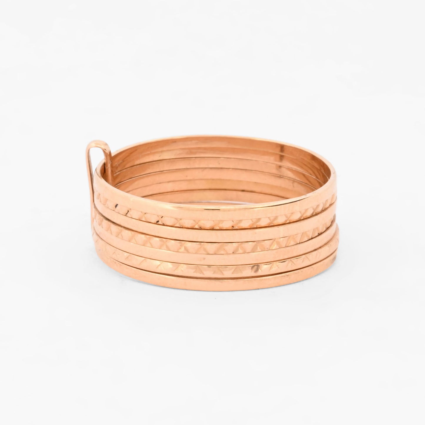 Anillo semanario de siete bandas móviles, combinando alianzas lisas y facetadas de oro amarillo 18kt. Pieza certificada y envío gratuito 