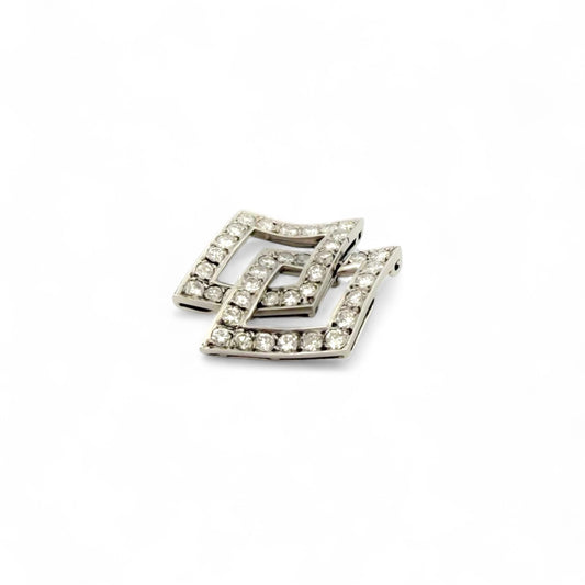 Colgante de dos rombos intercalados en oro blanco de 18kt y diamantes talla brillante. Joyería Compro Oro Barcelona. Ian'Or. Joyas restauradas. Envío gratis.