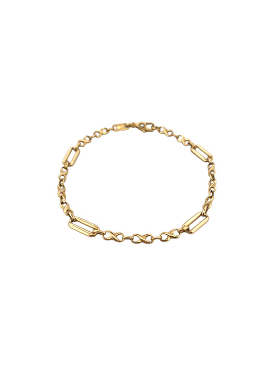 Comprar pulsera realizada en oro amarillo de 18kt con eslabones alternos y cierre mosquetón. pulseras de oro 18kt baratas al mejor precio.