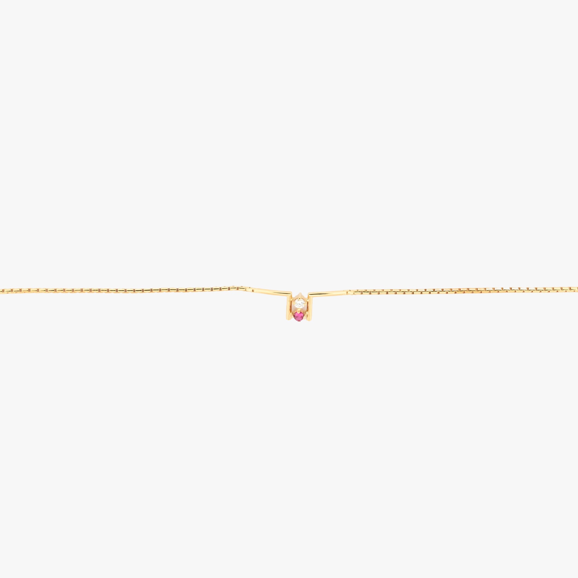 Comprar pulsera de oro amarillo de 18kt con 1 diamante y 1 rubí. Joyería Compro Oro Barcelona. Joyas de segunda mano. Envío gratis.