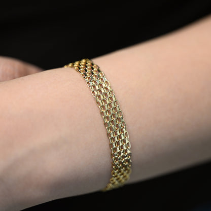 Comprar Pulsera oro amarillo de 18kt con malla ancha. La pulsera mide 18,5,3cm y dispone de cierre tipo cajón. Pulseras oro 18kt al mejor precio. Ian'Or.