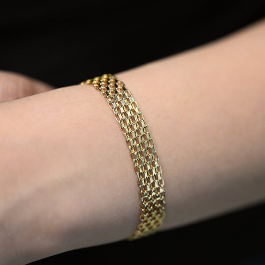 Comprar Pulsera oro amarillo de 18kt con malla ancha. La pulsera mide 18,5,3cm y dispone de cierre tipo cajón. Pulseras oro 18kt al mejor precio. Ian'Or.