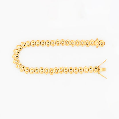 Comprar pulsera de Oro Amarillo de 18kt y Diamantes rinde homenaje a la elegancia rítmica y al brillo eterno. Joyería Compro Oro Barcelona. Joyas de segunda mano. Envío gratis.