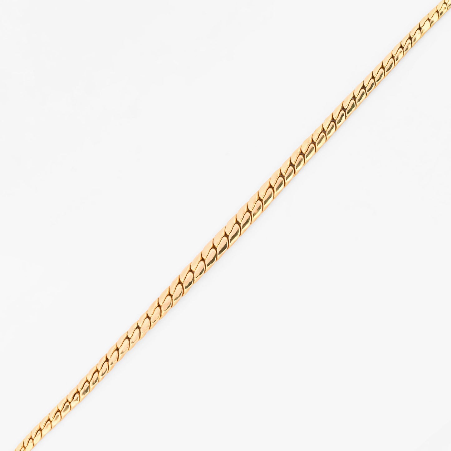 Collar plano graduado de oro amarillo 18K con un diseño de eslabones de malla compacta que incrementan tamaño hacia el centro. Envío gratuito pieza certificada.