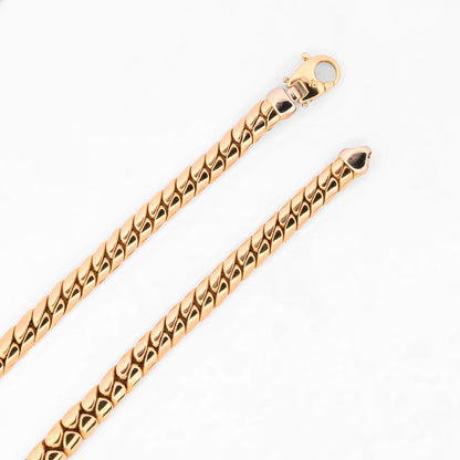 Comprar cadena barbada graduada de oro amarillo 18kt con eslabones planos que aumentan sutilmente su grosor hacia el centro. Envío gratuito pieza certificada.