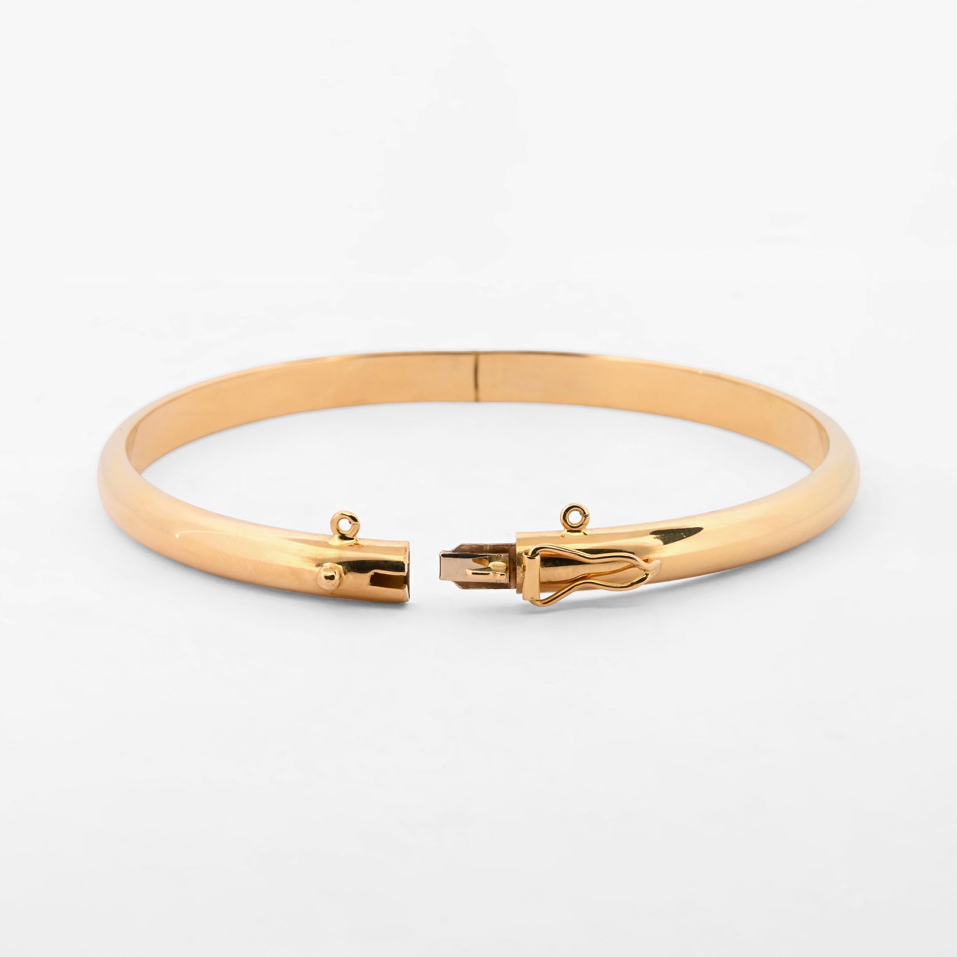 Comprar pulsera esclava de oro amarillo de 18kt con grabado. Esta pulsera dispone de cierre de cajón con brazo de seguridad. Joyas de segunda mano. Esclavas de oro de 18kt en Ian'Or.