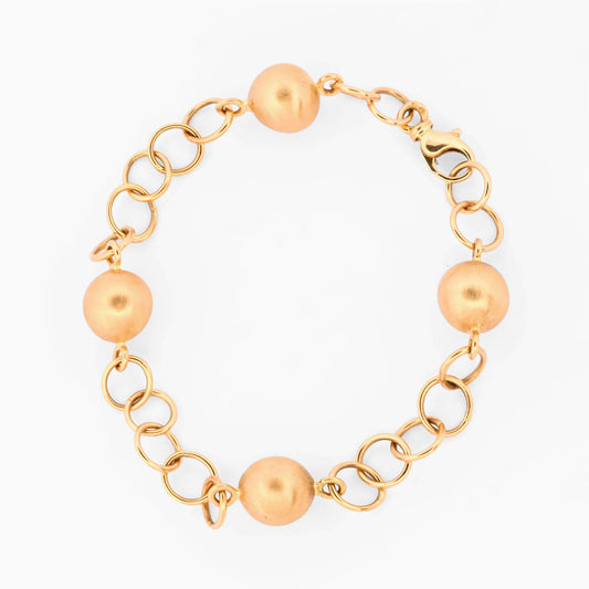 Pulsera de eslabones redondos alternados con esferas lisas de oro amarillo 18kt. Pulseras de oro baratas en Barcelona. Pieza certificada y envío asegurado 