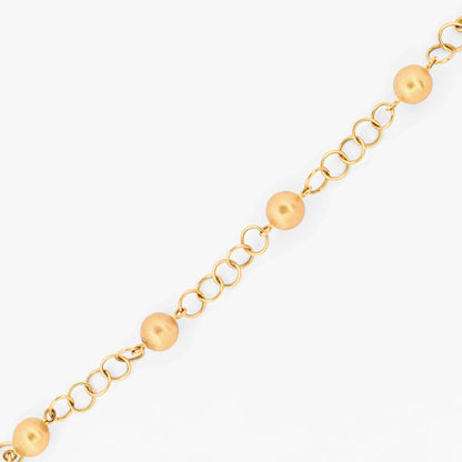 Pulsera de eslabones redondos alternados con esferas lisas de oro amarillo 18kt. Pulseras de oro baratas en Barcelona. Pieza certificada y envío asegurado 