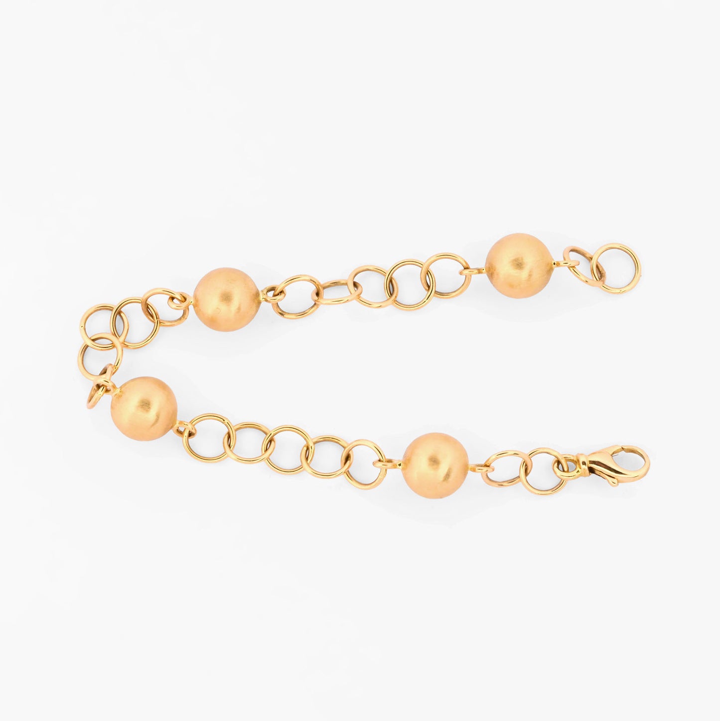Pulsera de eslabones redondos alternados con esferas lisas de oro amarillo 18kt. Pulseras de oro baratas en Barcelona. Pieza certificada y envío asegurado 