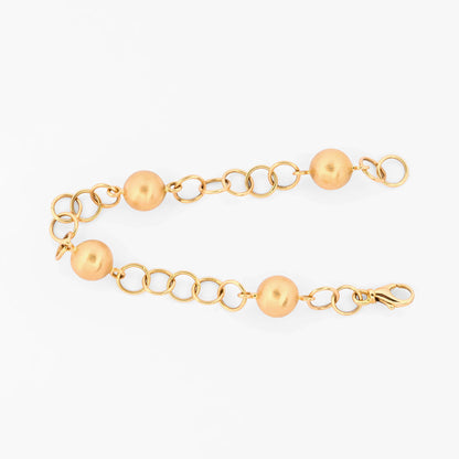 Pulsera de eslabones redondos alternados con esferas lisas de oro amarillo 18kt. Pulseras de oro baratas en Barcelona. Pieza certificada y envío asegurado 